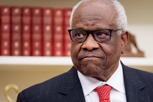 U.S. Supreme Court Associate Justice Clarence Thomas visits the White House on Feb. 5.