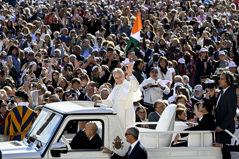 Pope Leo XIV greets an audience at the Jubilee of Catechists at the Vatican, Saturday, Sept. 27, 2025.