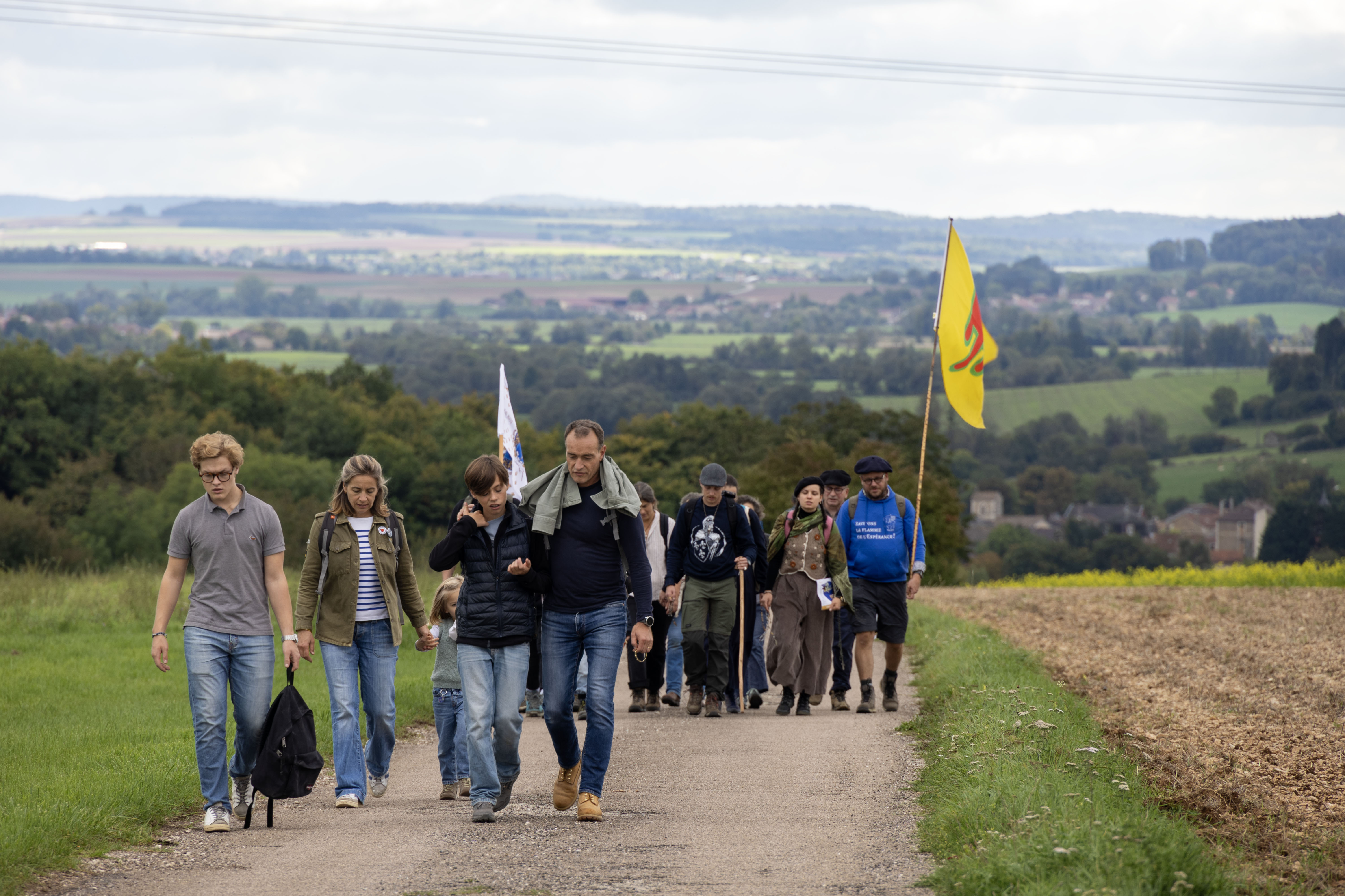 Pilgrims walk together to mark the 600th anniversary of the apparitions in France.