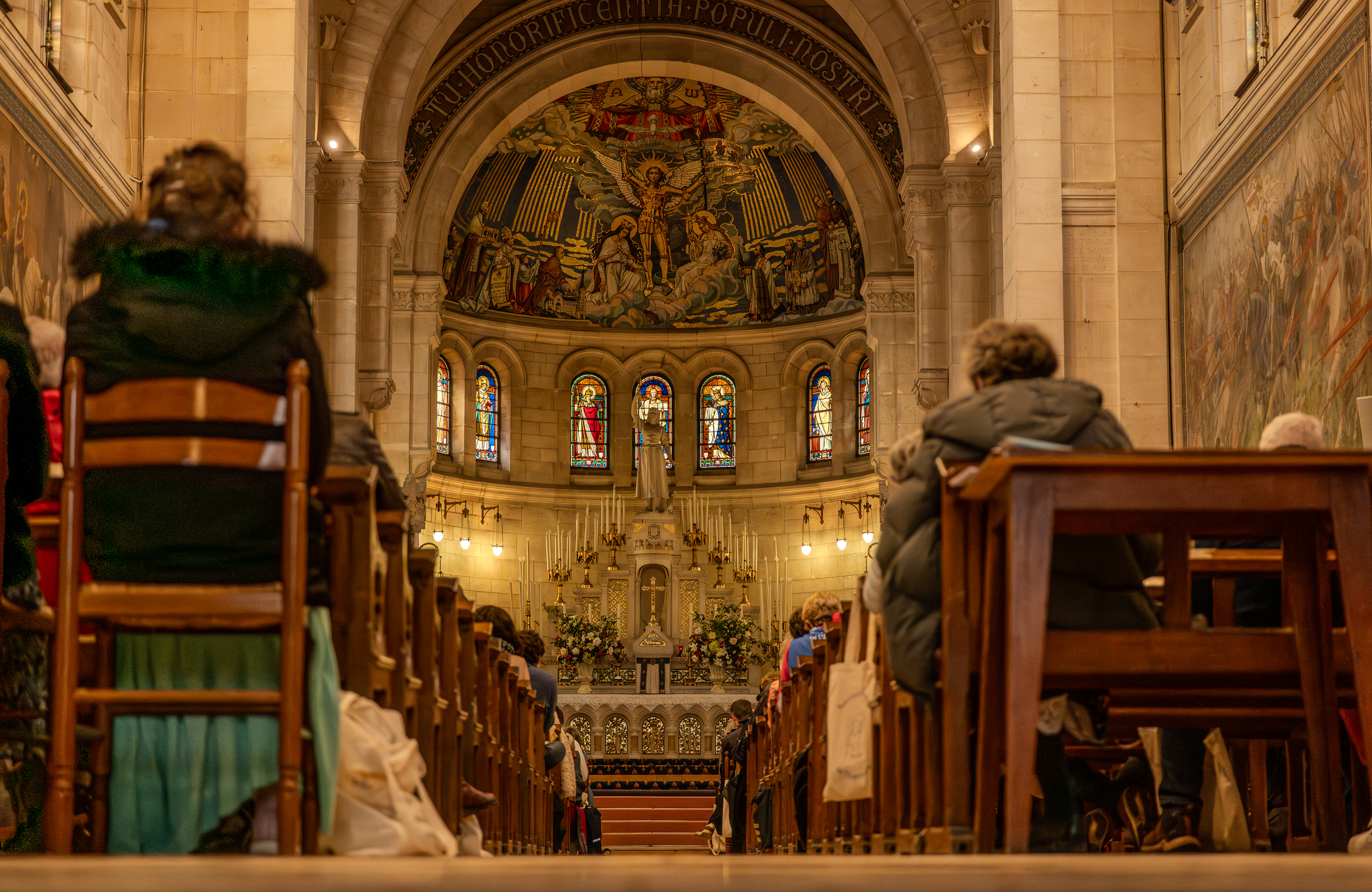 The faithful gather in prayer inside the cathedral during the pilgrimage.