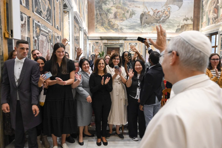 Pope Leo XIV greets participants attending the Oct. 1-3 Migrants and Refugees in Our Common Home summit in Rome on Thursday, Oct. 2, 2025.