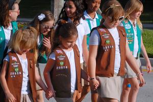 Girl Scouts in Florida taking part in a Veteran's Parade.