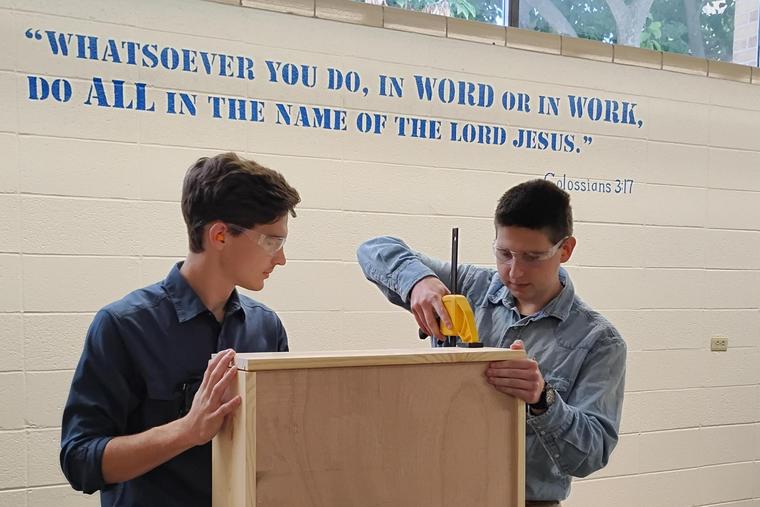 Students at work, inspired by faith. 