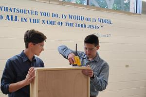 Students at work, inspired by faith. 