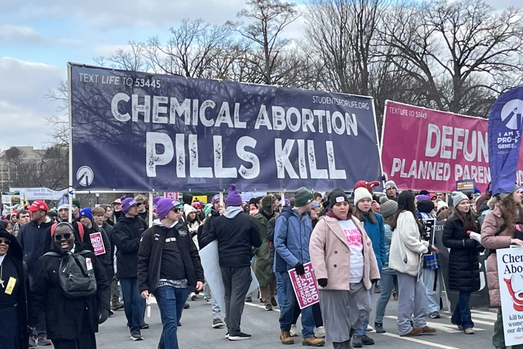Members of Students for Liberty protest chemical abortions at March for Life, Jan. 24, 2025.