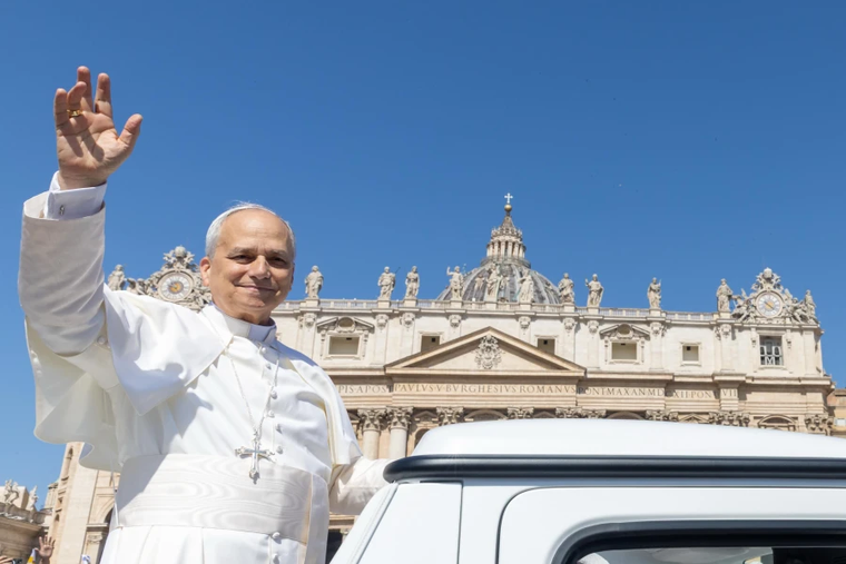 Pope Leo XIV waves from the popemobile at the crowds gathered in St. Peter’s Square for Mass on Pentecost Sunday on June 8, 2025.