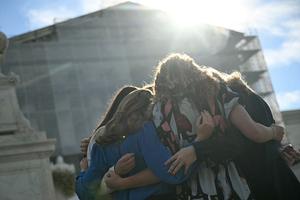Members of the group "Concerned Women for America" pray outside the US Supreme Court as the Court hears oral arguements in Chiles v. Salazar, a landmark case on "conversion therapy," on October 7, 2025, in Washington, DC. 