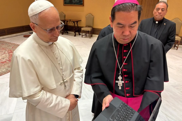 Pope Leo XIV receives a video from the Hope Border Institute from Auxiliary Bishop Anthony Celino on Oct. 8, 2025.