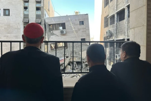 Latin Patriarch Cardinal Pierbattista Pizzaballa looks out at some of the destruction in Gaza.