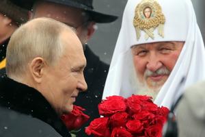 Russian President Vladimir Putin and Orthodox Patriarch Kirill attend a National Unity Day ceremony at the monument to Minin and Pozharsky in Moscow’s Red Square on Nov. 4, 2024.