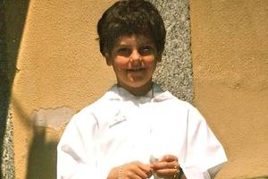St. Carlo Acutis on his first Communion day