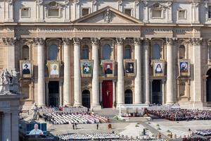 Pope Leo XIV presides at the Oct. 19, 2025, Holy Mass and canonization for the seven newest saints, whose portraits hang for all to see.