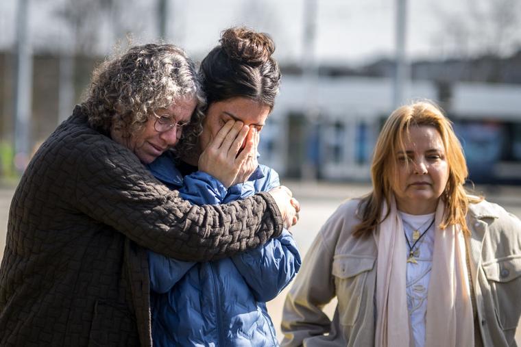 Former Hamas hostage Aviva Siegel (L) comforts her daughter Elan Tiv next to Former Hamas hostage Raz Ben Ami during a meeting with  sympathizers during their visit to the 55th session of the UN Human Rights Council in Geneva on February 29, 2024. Raz Ben Ami was released on November 29, 2023 as part of an extended temporary ceasefire deal. Aviva Siegel was released on November 26, 2023. 