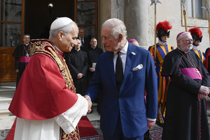 Pope Leo XIV and King Charles III meet before their prayer together in the Sistine Chapel during a historic meeting at the Vatican on Thursday, Oct. 23, 2025.