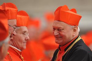 Romanian Cardinal Lucian Mureșan (r) is congratulated by other cardinals during the consistory on Feb. 18, 2012, at St. Peter’s Basilica at the Vatican.