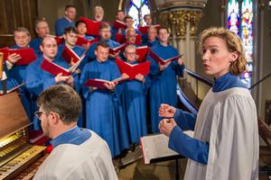 Mary Catherine Levri, associate professor of organ and church music at the University of Notre Dame, leads a choir.