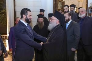 Greek Orthodox Patriarch John X Yazigi of Antioch and All the East (right) receives Ahmad al-Shar’a, the head of Syria’s transitional administration, on Oct. 26, 2025, at the patriarchal residence in Damascus.