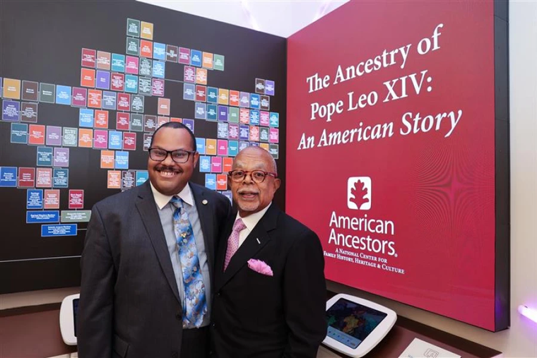 Jari Honora and Henry Louis Gates Jr. at the opening of the exhibit at American Ancestors headquarters in Boston.