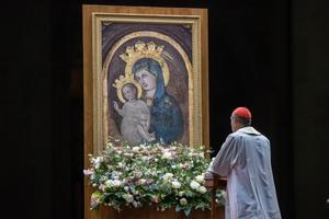 Cardinal Víctor Manuel Fernández, Prefect of the Dicastery for the Doctrine of the Faith, prays before an image of the Blessed Virgin Mary and Child during the rosary vigil for Pope Francis at the Vatican on Feb. 28, 2025. 