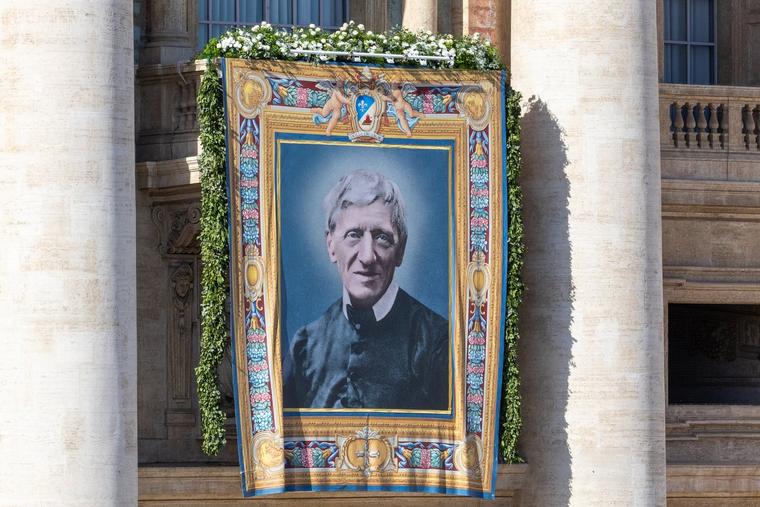 Tapestry of Saint John Henry Newman hangs in Vatican Square Nov. 1, 2025, on the day Pope Leo XIV declared the saint a doctor of the church.