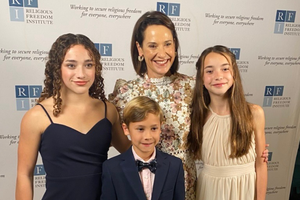 EWTN News legal analyst Andrea Picciotti-Bayer poses with three of her ten children at the Religious Freedom Institute's gala