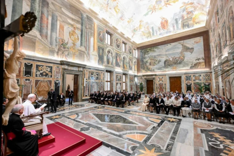Pope Leo XIV receives members of the Religious of Jesus and Mary, founded by St. Claudine Thévenet, and the Missionary Sisters of St. Charles Borromeo, known as the Scalabrinians, in the consistory hall at the Vatican on Nov. 6, 2025.