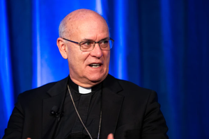 Bishop Kevin Rhoades of the Diocese of Fort Wayne-South Bend, Indiana, the chair of the U.S. Conference of Catholic Bishops’ religious liberty committee, speaks on the issue of immigration during a press conference on Nov. 11, 2025, at the USCCB’s fall plenary assembly in Baltimore.