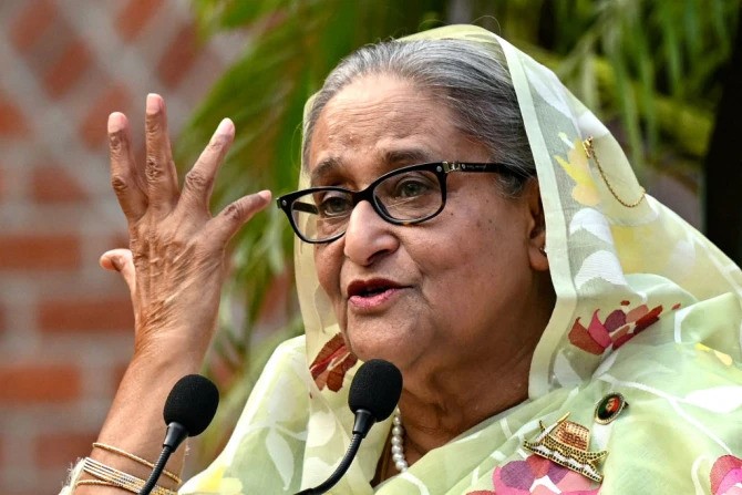Bangladesh’s Prime Minister Sheikh Hasina gestures while speaking to the media a day after she won the 12th parliamentary elections in Dhaka on Jan. 8, 2024. 
