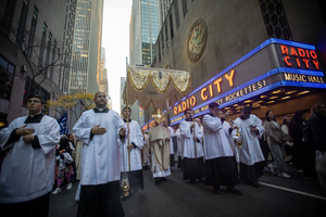 A Eucharistic procession sponsored by the Napa Institute passes by Radio City Music Hall in New York City on Oct. 15, 2024.
