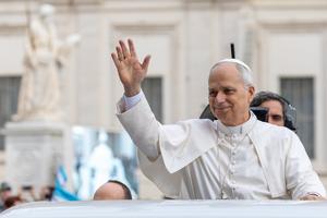 Pope Leo waves during his Oct. 22, 2025, general audience.