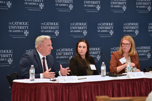 John Richmond, Danielle Pinter and Annick Febrey speak at a Nov. 14 panel at The Catholic University of America.  