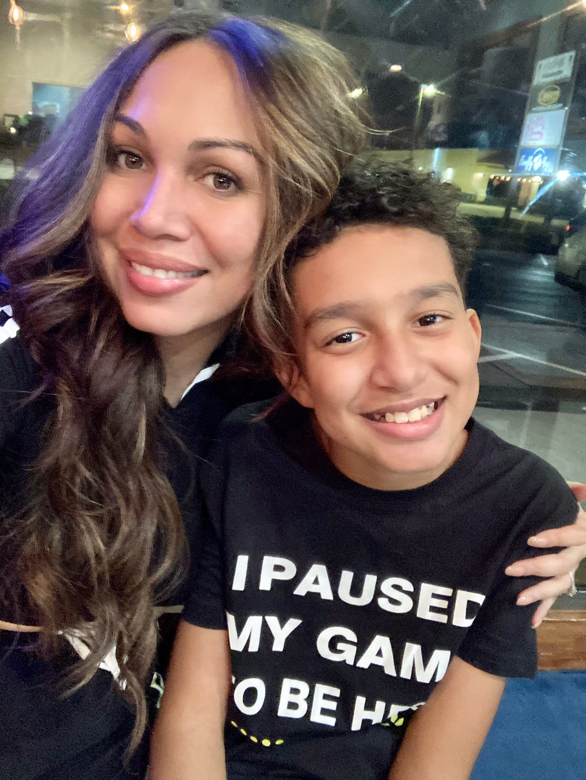 Sewell Setzer III poses with her mother, Megan Garcia. 