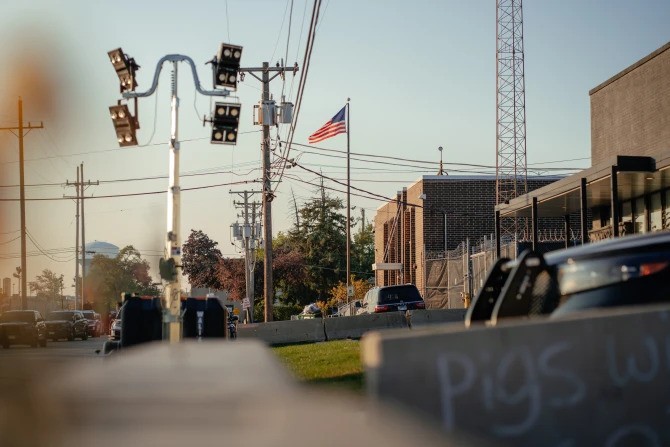 Police vehicles surround the Immigration and Customs Enforcement facility on Oct. 31, 2025, in Broadview, Illinois.