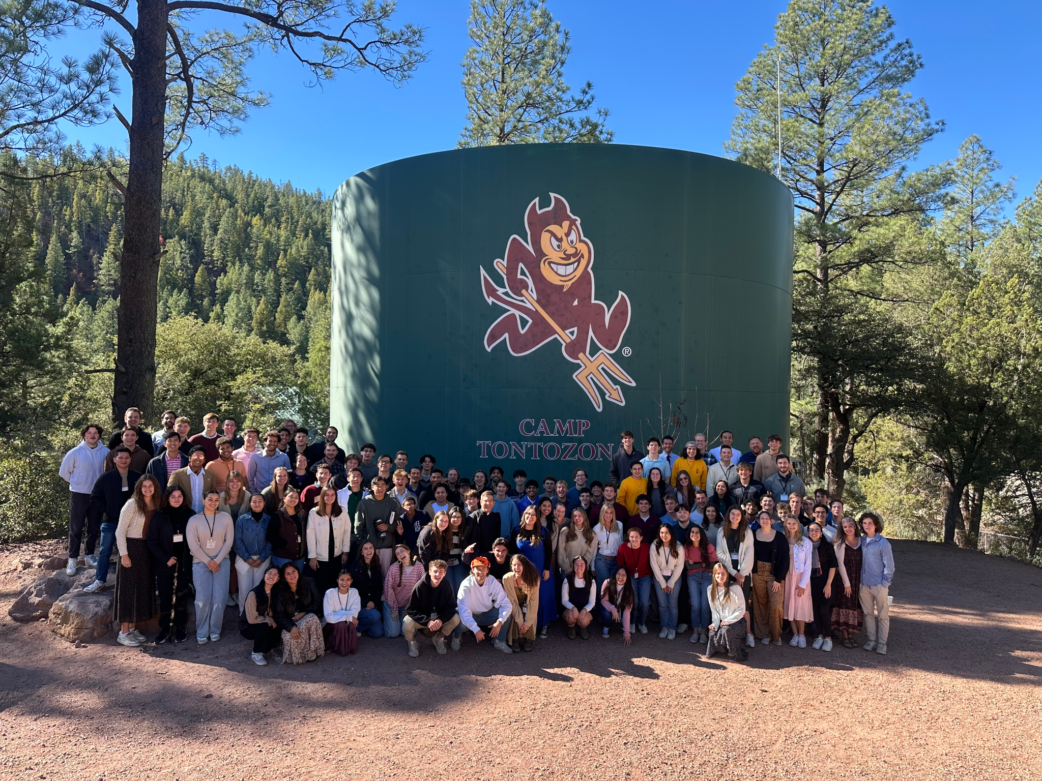 Ryan Ayala (they show the ASU Newman Center interior and a recent retreat group of students)