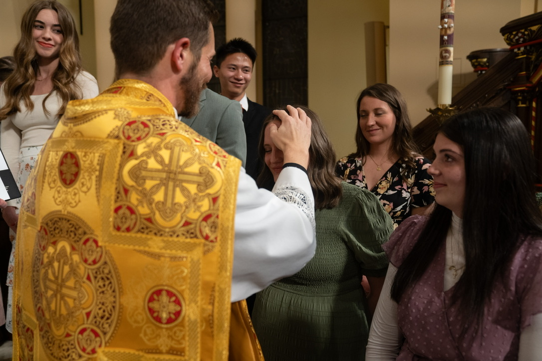 Libby Wilkins being received into the Church at the Easter vigil. Courtesy of Libby Wilkins