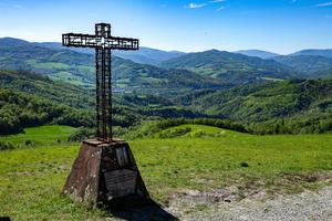 A cross stands in Montse Sole Historical Park in memorial of the victims of the massacres carried out there by Nazis in 1944. 