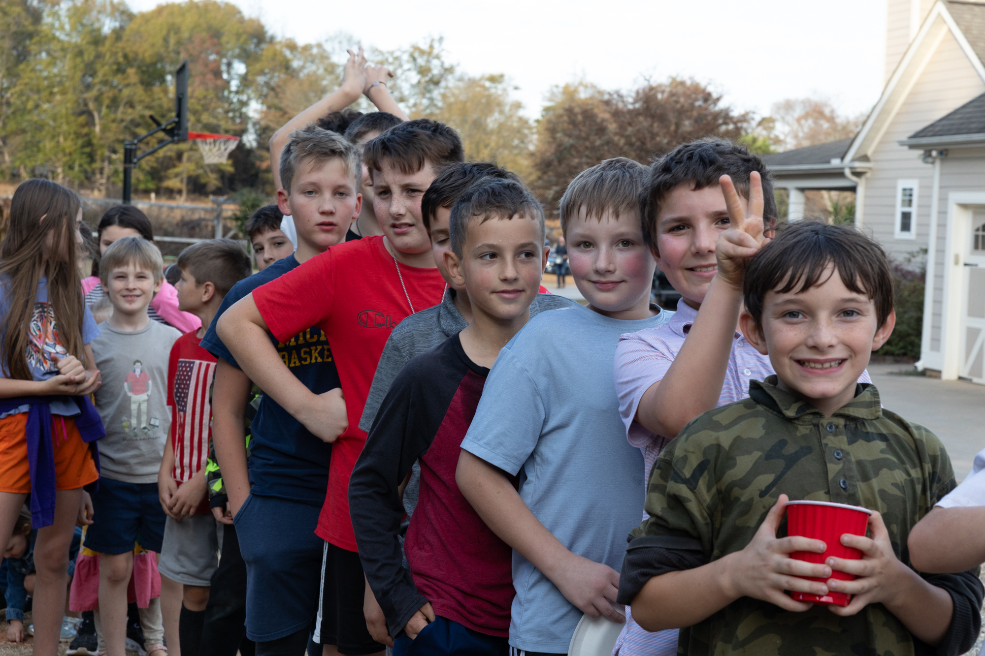 Kids attend the monthly Rosary at Kathleen Billings' home with 160 in attendance in November. 