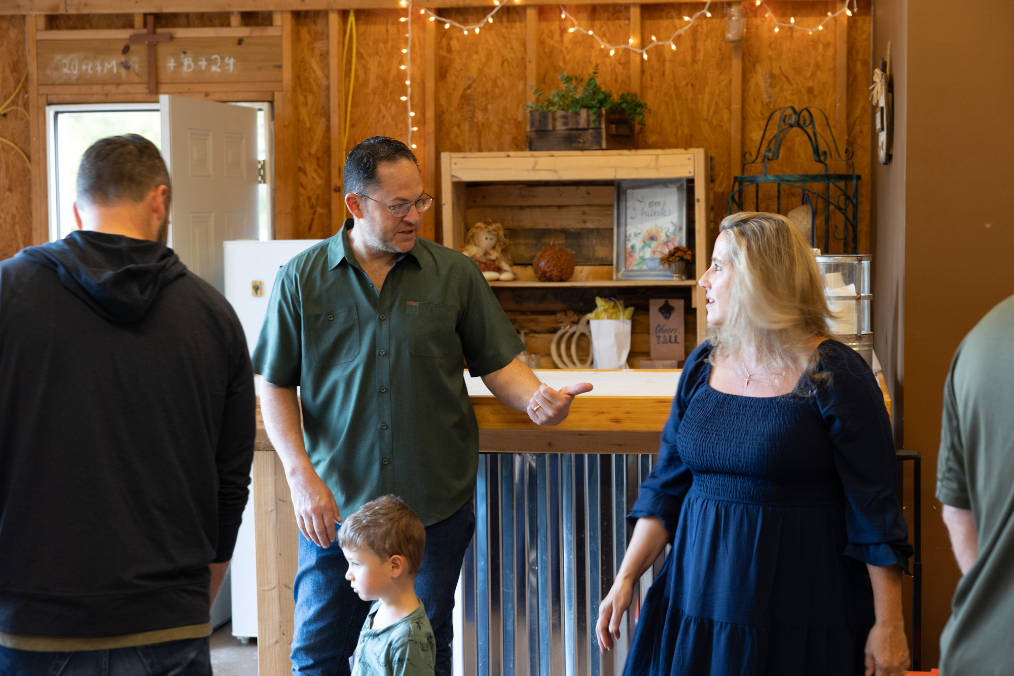 Families and friends gather in Kathleen Billings home and yard for the monthly Rosary. 