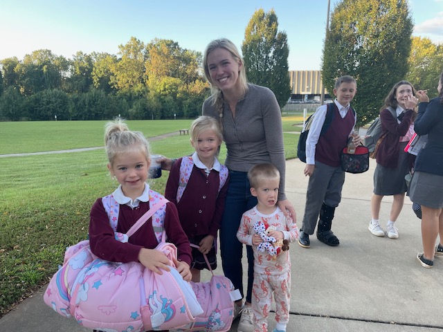 Rene Glembowski drops her children off at Sacred Heart Hybrid Academy.