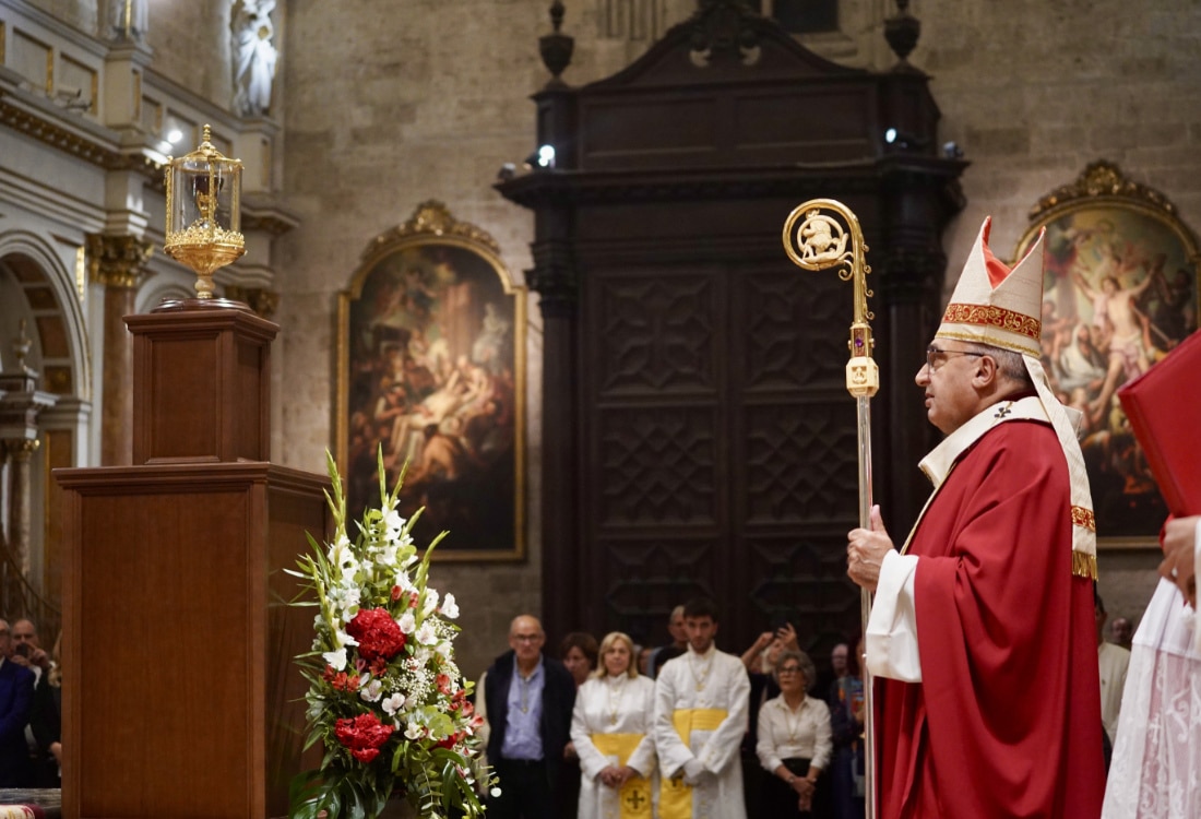 Valencian Archbishop Enrique Benavent venerates the Holy Chalice during the Mass on Oct. 30. 