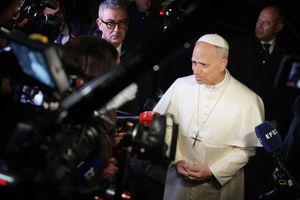 Pope Leo XIV speaks to reporters after a daylong stay at the papal villa of Castel Gandolfo on Nov. 25, 2025.