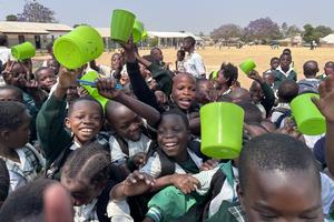 Young students are ready to eat in Zambia.