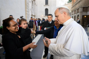 Nadia Howlader is given a key to a new apartment by Pope Leo XIV on Nov. 16 on the ninth World Day of the Poor.