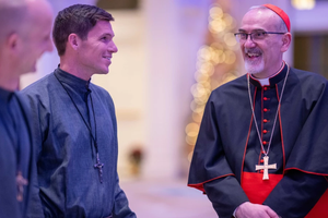 Cardinal Pierbattista Pizzaballa, the Latin patriarch of Jerusalem, speaks with members of Society of Our Lady of the Most Holy Trinity (SOLT), during a Dec. 5, 2025, fundraising dinner to support of Christians in the Holy Land at St. John's Resort in Plymouth, Michigan.