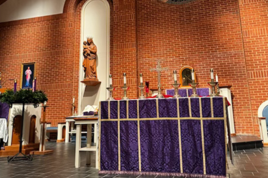 The altar adorned with purple in Sacred Heart Parish in Winchester, Va. 