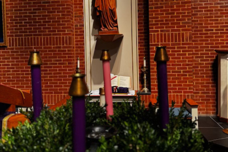 Advent candles inside Sacred Heart Parish in Winchester, Va. 