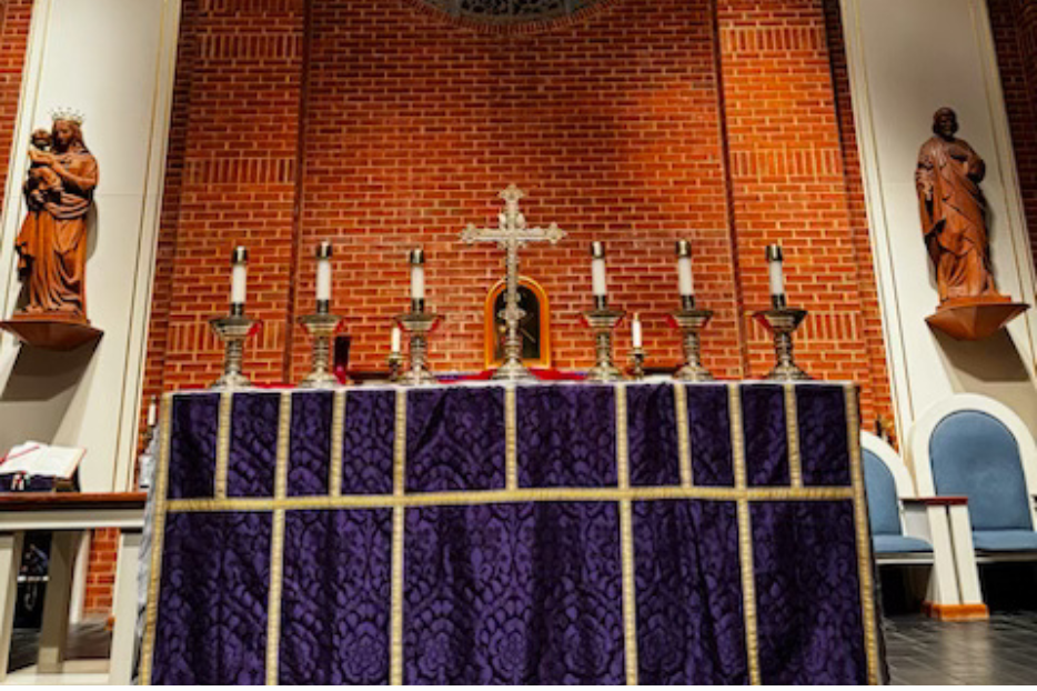 The altar ad purple in Sacred Heart Parish in Winchester, Va. 