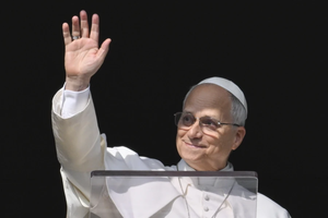 Pope Leo XIV greets pilgrims gathered in St. Peter's Square at the Vatican for the Angelus on Dec. 14, 2025.