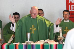 Bishop Brendan Cahill of the Diocese of Victoria, Texas, the new chair of the bishops’ immigration committee, celebrates Mass at the U.S.-Mexico border in September 2019.