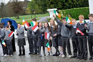 Schoolchildren attend a ceremonial welcome and tree planting at Aras an Uachtarain, the official residence of the president of Ireland, during a state visit by His Serene Highness Prince Albert II of Monaco and his fiancee, Charlene Wittstock, on April 4, 2011, in Dublin. 